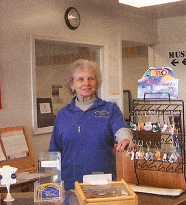 Jackie Brooks, former gift shop manager, former board member, at Estrella Warbirds Museum, Paso Robles, CA